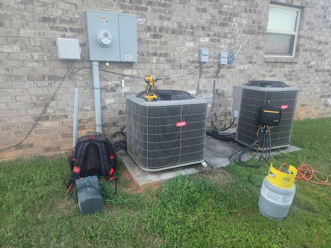 Multiple outdoor HVAC units at a commercial property