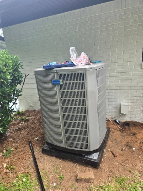 Residential outdoor condenser installation